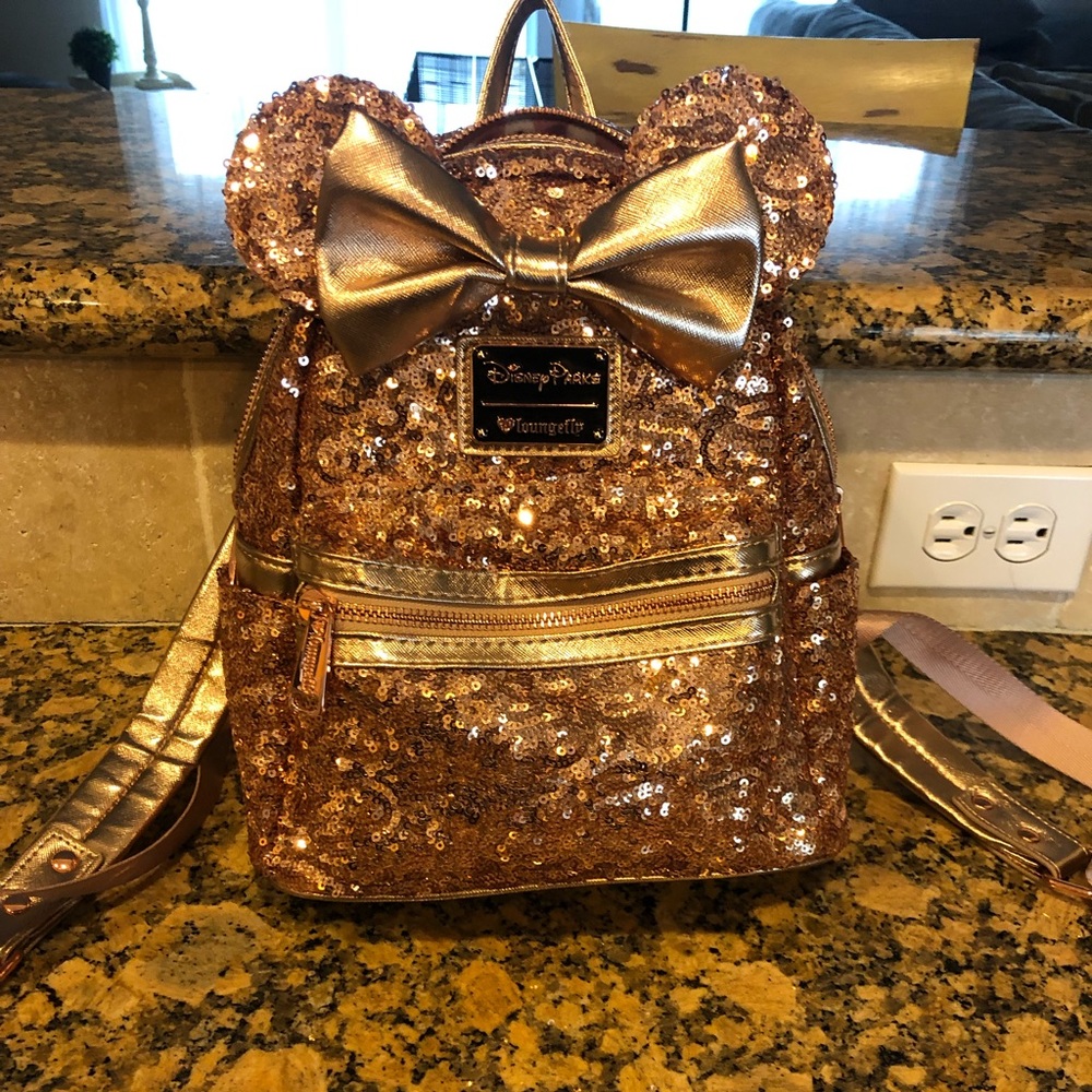 Disney Park sequin mini backpack.